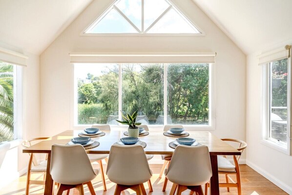 Natural light streams into the dining area