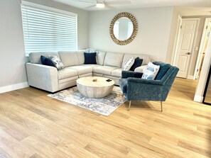 Sectional sofa with pull out section for single sleeper