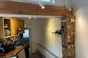 Handmade kitchen 
Gas hob and electric oven 
Microwave and washer drier 