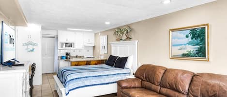 Studio with a seating area and sofa bed