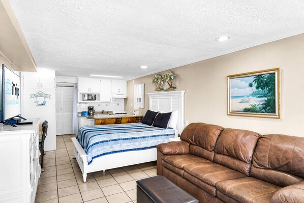 Studio with a seating area and sofa bed