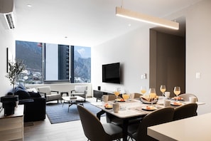Dining area for six, adjacent to the open-plan kitchen and living space.
