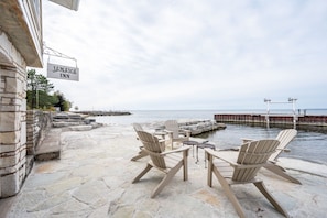 Nestled along the serene waterfront, Three Leaves Bayside Retreat offers breathtaking water views, direct lake access, and a wealth of amenities designed to provide a memorable and relaxing stay