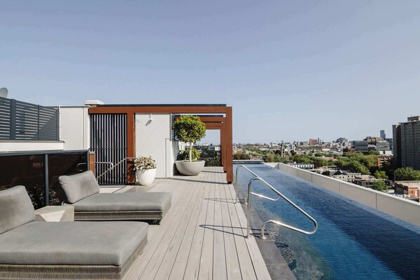 Shared rooftop space: Take in breathtaking views from the shared rooftop infinity pool, where you can bask in the sun and enjoy a tranquil escape high above the bustling city