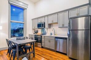 Cozy kitchen and dining setup, designed for comfort and convenience.