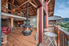 Log fire, piano, Sonos, UK Sky TV, IMac and office area all in the upper lounge.