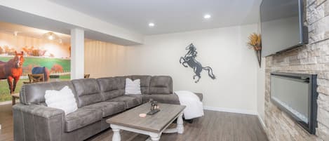 Kick back & relax while you stream your favorites in the lower-level living area