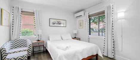 Binge your favorites on the smart TV & lounge in the cushy queen bed