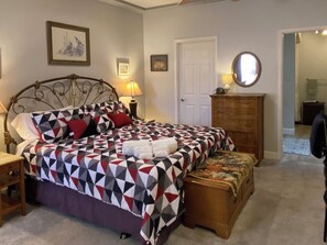 King bed has a memory foam topper.