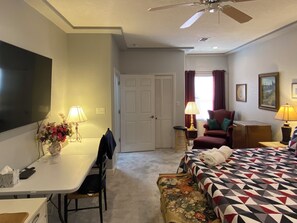 There’s a mini fridge by the wing back chair.
