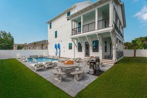 Large backyard with space for the whole family to relax in the sun!
