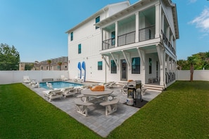 Large backyard with space for the whole family to relax in the sun!