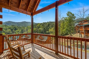 Main level deck with comfortable seating—perfect for enjoying the outdoors.