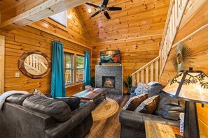 Cozy living room with stunning mountain views—perfect for relaxation and taking in the scenery.