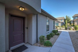 Well-lit entryway with keypad door lock