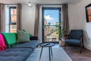 Comfortable Living Space featuring:
- Ample seating
- Smart TV with Netflix
- 1 x Sofa Beds
- Top Floor Views
