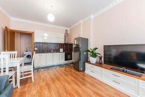 Fully-Equipped Kitchen and Dining Area