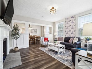 🛋️ Relax in our cozy, nautical-themed living room — perfect for movie nights, family chats, and making memories!