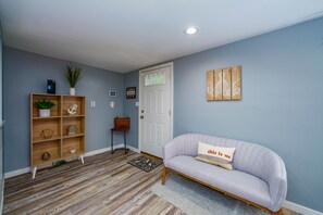 Step into luxury - your cozy sofa awaits just beyond the front door.