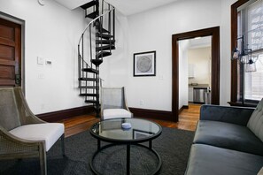 Whimsical spiral staircase, inviting seating, and a touch of modern charm. Perfect for a cozy escape. 🧖‍♀️ #CozyVibes