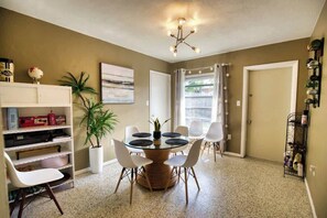Enjoy meals in style at this mid-century modern dining setting.