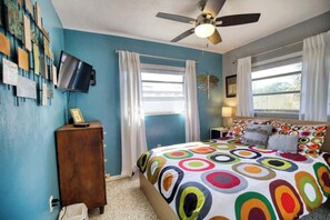 Sweet dreams await in this colorful and cozy bedroom.