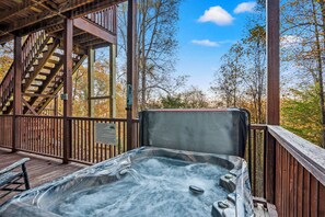 Soak in the serenity and enjoy stunning mountain views from this cozy hot tub.