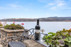 Sip some wine on the patio with a perfect view of Coeur d'Alene Lake!