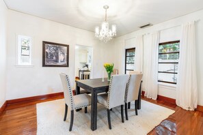 Dining area with seating for 6. Additional seating is available in the kitchen.