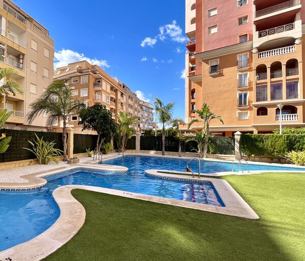 Enjoy a large communal swimming pool surrounded by landscaped gardens, perfect for relaxing in the sun or taking a refreshing dip in a peaceful and natural environment.