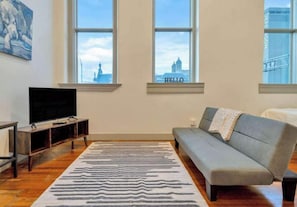Living Room: We have multiple suites at this property. While our room offerings are based on the design seen in the photos, please note that the layout may vary and each unit has their individualized elements of design and decorative features.