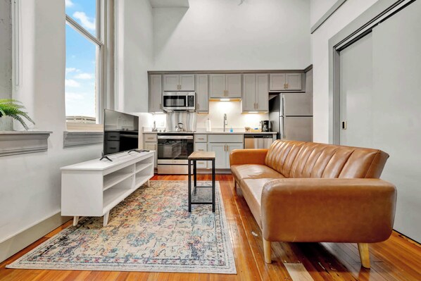 Living Room: You can also relax in the cozy living space equipped with a smart TV, perfect for unwinding after a day of exploring.