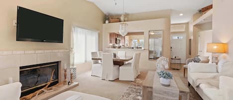 Curl up in the serene living room & enjoy a movie night at home