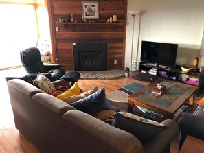 To the left is a sliding door to the deck.