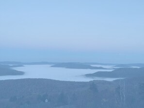 An island in the sky.  What looks like snow is the fog settling down.