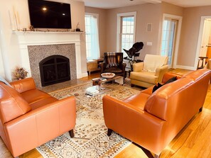 Living room. Very cozy! TV for movie watching!