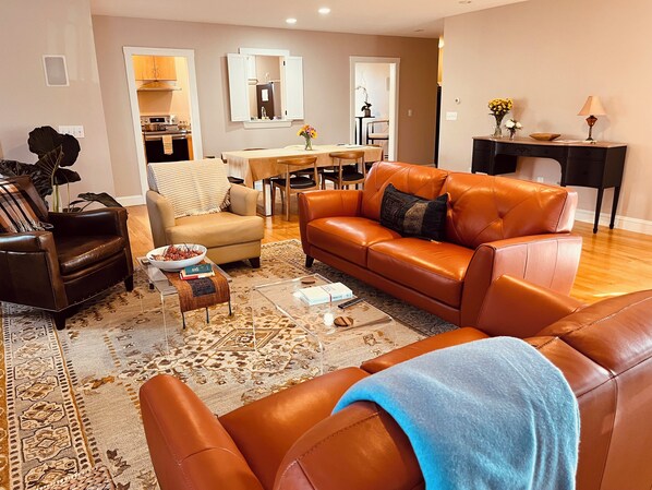 Living area looking over to dining area and kitchen. Plenty of sitting space.