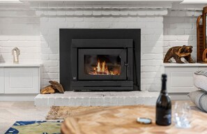Relax in front of the wood fire