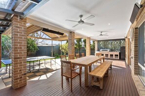 Outdoor dining, kitchen and games