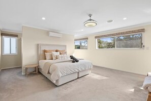 Master bedroom with king size bed and ensuite