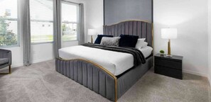 Luxurious king bed, TV, private bathroom and a baby crib – everything you need for a comfortable and family-friendly stay.
