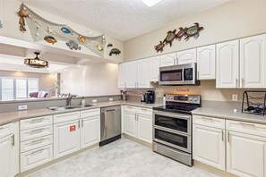 Enjoy a fully equipped kitchen with stainless steel appliances, ready for you to create anything from morning coffee to a gourmet dinner.