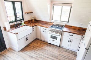 Very clean fully renovated kitchen. You’ll enjoy making something here.
