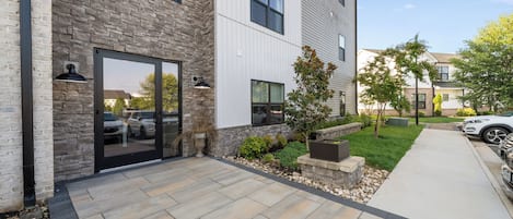 Level and well lit entrance - first floor unit.