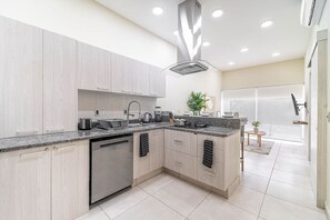 Cook up a feast in this fully equipped kitchen, complete with modern appliances and ample counter space