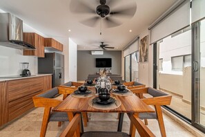 Gather around the table in this inviting dining area, perfect for sharing meals and memories with loved ones