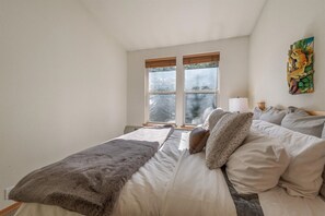 Master bedroom with very comfortable king size bed, full bathroom ensuite, views of the mountain, and more.  TV will be installed on the wall by the holidays!
