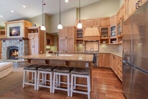 Gourmet kitchen with large island with espresso machine, drip coffee machine, large kitchen island, beverage center, and everything else you'll need!