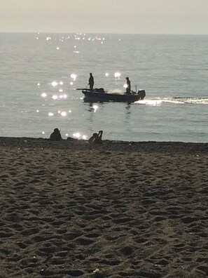 Pizzo Beach Club at sunset
