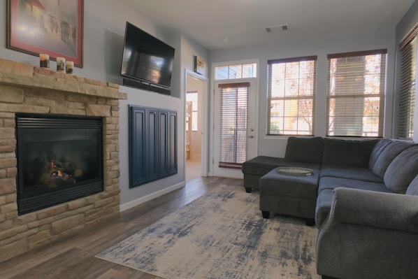 Unwind with smart TV streaming, a cozy fireplace, and provided board games.